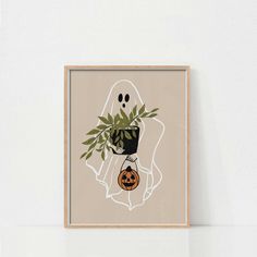 a ghost holding a potted plant on top of a white shelf next to a wall