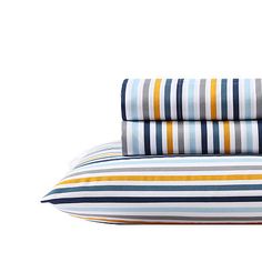 three striped sheets stacked on top of each other in blue, yellow and white colors