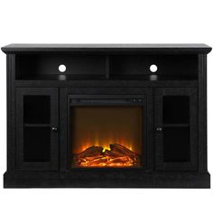 an entertainment center with a fire place and two lights on the front, in black