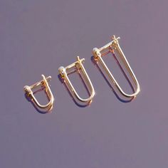 Latch huggie earring   14k yellow gold  Sold individually  Made by EMBLM in Los Angeles, CA 3 Sizes: Large— 23mm long, 9.5mm wide, 7mm wearable surface Medium— 15.75mm long, 9mm wide, 6.5mm wearable surface Small— 10.45 mm long, 8.25mm wide, 5.5mm wearable surface * If you would like a pair, you must purchase a quantit Luxury Handmade Huggie Earrings, Minimalist Yellow Gold Oblong Hoop Earrings, Modern 14k Gold Huggie Cartilage Earrings, Yellow Gold Paperclip Earrings For Everyday, Everyday Yellow Gold Paperclip Earrings, Yellow Gold Oblong Earrings For Everyday, Minimalist Tarnish-resistant Oblong Jewelry, Modern Huggie Jewelry With Spring Ring Clasp, Minimalist Yellow Gold Earrings With Rectangular Links