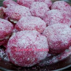 powdered sugar cookies in a glass bowl