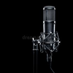 an old fashioned microphone on a black background royalty images and clippings are available for use