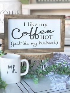 a wooden sign that says i like my coffee just like my husband