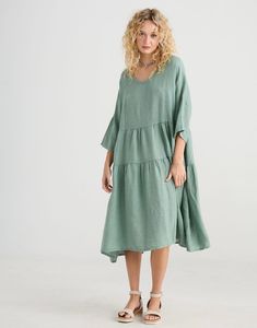 The Linen Stella is one of our most popular dresses ...tiered layers that form an A-line dress with a gorgeous flattering flare towards the bottom of the dress. Our Stella dress is oversized and loose, made in Italy from Italian pre-washed linen which is a lovely weight, slightly heavier than handkerchief linen but with a lovely body to it making it perfect for wear all year round. It can be worn by itself in Summer and layered during the colder months with long t-shirts, boots, and leggings. Th Green Linen Lagenlook Dress, Flowy Green Linen Dress, Flowy Sage Casual Dress, Green Flowy Linen Dress, Spring Tiered Linen Midi Dress, Plus Size Linen Dress, Pastel Sage Green, Pale Sage Green, Plus Size Linen