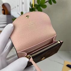 Features: N64423 Combining Damier Ebene canvas with colorful grained cowhide leather, the Rosalie coin purse is a sweet, feminine design. Its tiny proportions allow it to slip easily into a bag or pocket, yet it is surprisingly spacious. Its distinctive rounded flap is secured with a press-stud. 4.3 x 3.1 x 1 inches (length x Height x Width) W 11 cm x H 7.9 cm x D 2.5 cm Rose Ballerine Pink Damier Ebene coated canvas Grained cowhide-leather trim Grained cowhide-leather lining Gold-color hardware Press-stud closure Gusseted compartment Zipped coin pocket Flat pocket 2 card slots Dior And I, Damier Ebene, Hermes Bags, Feminine Design, D 2, Bags Designer Fashion, Lady Dior Bag, Exclusive Bag, Fendi Bags