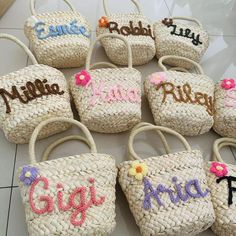 baskets with name written on them sitting on the floor