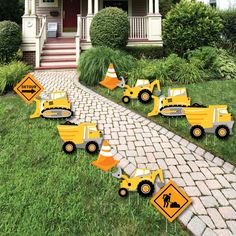 construction zone yard signs and cones in front of a house