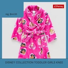 Your toddler girl will love wrapping herself up in this plush Disney Collection robe inspired by Disney Princesses. Made from super-soft fleece, it features a waist tie and a colorful Disney Princess print, plus two front pockets. Wear it over her favorite pajama set with slippers. Character: Disney PrincessClosure Type: Open FrontNeckline: Hooded NeckPockets: 2 Front Slip PocketsSleeve Length: Long SleeveFiber Content: 100% PolyesterFabric Description: PlushLining: UnlinedRobe Length: Knee Len… Character Disney, Kids Robes, Disney Princesses, Toddler Girls, Waist Tie, Pajama Set, Toddler Girl, Knee Length, Slippers