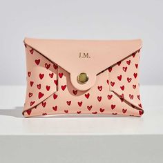 Made from soft blush pink leather and printed with red hand-drawn hearts, this coin purse has love to share.Our personalised leather coin purses are the perfect size for when you don’t need your full wallet: night’s out, holidays, travelling light. With initials on the front and a secret message printed inside, they are the perfect gift for Mum on Mother’s Day, your best friend’s birthday, a treat for yourself.Handmade from sustainably sourced, premium quality British leather and made in the UK, Cute Love Heart, Red Love Heart, Cute Wallets, Origami Design, Red Love, Leather Coin Purse, Secret Messages, Women Pink, Best Friend Birthday