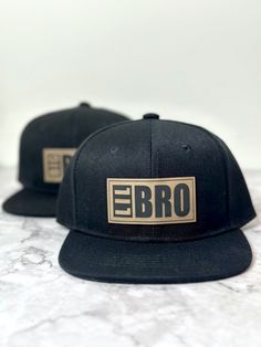 The perfect Big Bro / Lil Bro hats are here!  These trendy, Popular Snap Back Hats, are sure to please.  Features a Firm Rectangular Brim, Sturdy Crown. Light Grey Denim Fabric with Black Brim.  Made of 100% Polyester S I Z E --  BABY (0-3 years)  KIDS (3-9 years) ADULT/YOUTH (9 and up)  Check out our matching Newborn Baby Beanie --  https://thebugandbrim.etsy.com/listing/1567820628 Snap Back Hats, Crown Light, New Baby Announcement, Lil Bro, New Baby Announcements, Baby Rooms, Baby 2, Grey Denim, Snap Backs