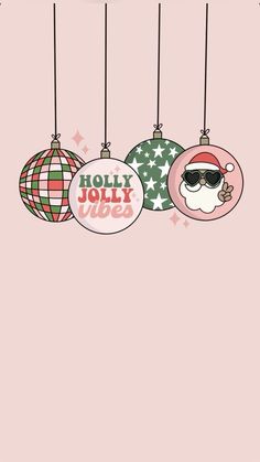 christmas ornaments hanging from strings with the words holly jolly noel on them and an image of santa