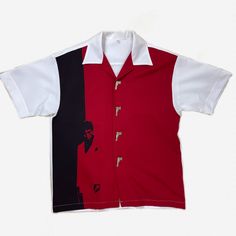 Very Rare Vintage Red Black And White Button Up Shirt With Al Pacino Scarface Graphic On The Front And Metal Gun Shaped Buttons. Made Of A Relatively Lightweight Material With A Decent Amount Of Stretch. No Tags, See Measurements For Sizing. Fits About An Xl. Excellent Condition Measurements: Length: 30” Chest: 23.5” Hem: 22.75” Shoulder: 22.25” Sleeve: 10” Bundle Deal Info In Bio Red Retro Shirt With Camp Collar, Retro Red Shirt With Camp Collar, Red Graphic Print Button-up Top, White Button-up Camp Shirt With Placket, White Camp Shirt With Spread Collar And Button Closure, White Camp Shirt With Spread Collar, Red Collared Cotton Camp Shirt, Red Cotton Collared Camp Shirt, Red Camp Shirt With Button Closure And Short Sleeve