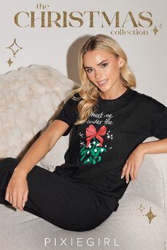 Get ready for Christmas with the new PixieGirl pyjama set. Made from a comfortable cotton fabric this set features short sleeves, a scoop neckline, a Christmas slogan & print. Wear with slippers and a dressing gown for a look you can wear on repeat this festive season. Mistletoe Print, Christmas Slogans, Christmas Pajama Set