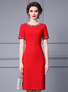 Feel the allure of timeless elegance with this stunning red dress, designed to make a bold statement at any event. This dress features a classic, fitted silhouette that flatters your figure, ensuring you look and feel your best. The striking red fabric is complemented by exquisite floral embellishments around the neckline and sleeves, adding a touch of glamour and sophistication. The short sleeves provide a modest yet stylish look, perfect for both formal and semi-formal occasions. The dress falls just above the knee, offering a chic and versatile length that can be paired with various accessories to suit different occasions. Crafted from high-quality materials, this dress ensures comfort and durability, making it a valuable addition to your wardrobe. Whether you��re attending a cocktail p Fitted Floral Embellished Formal Evening Dress, Fitted Floral Embellished Evening Dress For Banquet, Elegant Embellished Evening Dress For Red Carpet, Red Short Sleeve Evening Dress For Formal Occasions, Elegant Embellished Dresses For Red Carpet, Elegant Red Embellished Evening Dress, Elegant Red Evening Dress With Short Sleeves, Red Elegant Short Sleeve Evening Dress, Red Fitted Short Sleeve Evening Dress