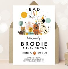 a birthday card with dogs and balloons on it, says bad to the bone let's party is turning two