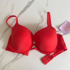 New With Tags. Vibrant Red Color Red Fitted Seamless Bra, Red Padded Push-up Bra, Elegant Red Seamless Bra, Red Push-up Bra With Padded Cups, Red Fitted Push-up Bra, Red Stretch Push-up Bra, Seamless Red Push-up Bra, Red Seamless Push-up Bra, Red Compressive Sports Bra