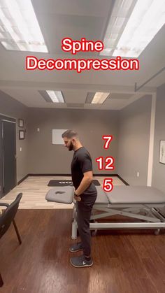 a man standing in front of a bed with the words spin and decompression on it