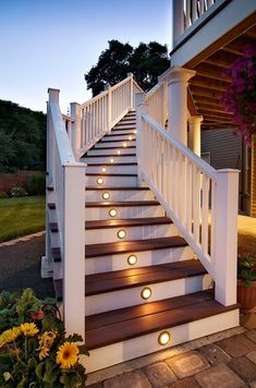 some lights are lit up on the stairs