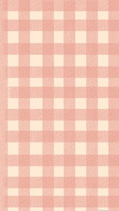 a pink and white checkered wallpaper with a clock on the top of it