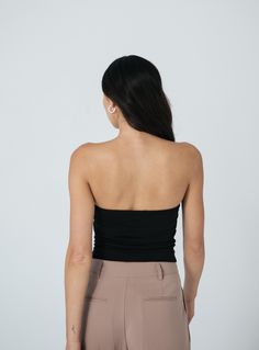 Details Crystal is the tube top your closet has been missing. Double lined on the front and she does not slip. Featuring a hold-you-in fabric and sits at the natural waistline. Made in LA Pre-washed Stretch Bandeau Camisole With Built-in Bra, Fitted Tube Top With Built-in Bra For Night Out, Stretch Tube Top With Built-in Bra, Black Bandeau Tank Top With Built-in Bra, Versatile Black Halter Top With Built-in Bra, Strapless Stretch Seamless Camisole, Chic Strapless Stretch Camisole, Seamless Stretch Strapless Camisole, Strapless Stretch Tank Top For Night Out