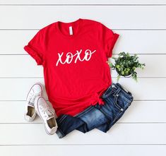 XOXO Valentines Day T-shirt.  Choose your size Washable  Perfect for Valentine's Day  True to size Red shirt white letters Short sleeves  Made to order! Free shipping Red Tshirt Outfit, Valentine Graphic, Red T Shirts, Cricut Shirts, Tshirt Outfit, Valentines Day Shirt, T Shirts Women, Valentine's Day Outfit, Shirts Women