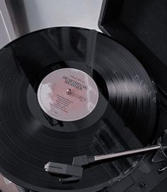 an old record player with its turntable removed from it's side by itself