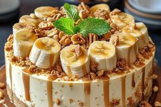 there is a cake with bananas and nuts on it