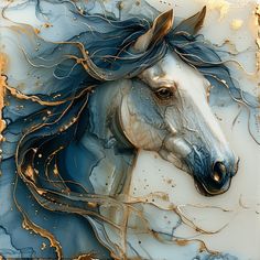 a white horse with blue manes on it's head is shown in gold foil