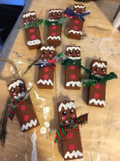 several gingerbreads are arranged on a table