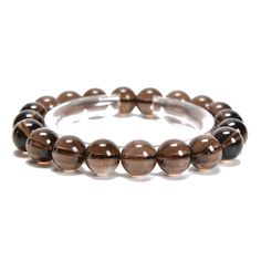 "Check out our Coupon Codes Below! Material: Natural Smoky Quartz (Not Treated or Dyed)  Beads Shape: Smooth Round Color: Brown Size: 8mm - Approx 25 Beads Per 7.5\" Bracelet 10mm - Approx 20 Beads Per 7.5\" Bracelet The Smoky Quartz Mined in Brazil Note:  -Gemstone bead sizes are approximate and may have a +/- 0.5mm difference.   -Gemstone bead drill hole sizes are approximate and may have a +/- 0.2mm difference. Use our Coupon Codes for Big Savings! 10% off when you spend $50LRC10 15% off when Bead Sizes, Gem Show, Rose Quartz Beads, Solve The Problem, May 13, Bracelets And Charms, Precious Gemstones, Smoky Quartz, Bracelet Sizes