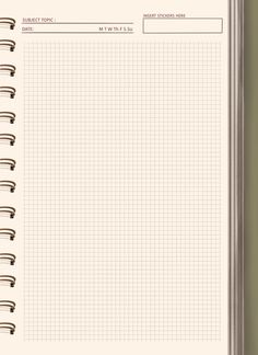 an open notebook with lined paper on top