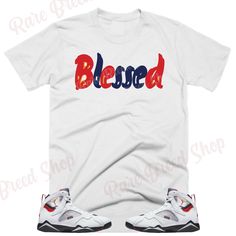 Custom Designed Sneaker T Shirt T-Shirt Features - Comfortable and light, premium short sleeve tee. 🔹 Premium fit 🔹100% Soft cotton 🔹Light fabric (4.3 oz/yd² (146 g/m 🔹Tear away label Shoes Not Included Custom Made - Not Adidas, Nike, or Jordan Brand Sneaker Tee, Sneaker T-Shirt The sneakers/shoes are not being sold in this product. You are only purchasing the tshirt/hoodie/socks/sweatshirt/tank top/hat/shorts. Shoes are NOT included. The shoes displayed are sold separately elsewhere and are Short Sleeve Sublimation Design With Text Print For Streetwear, White Relaxed Fit T-shirt For Fans, White Fan Apparel Shirt With Sublimation Print, White Sublimation Print Shirt For Fans, White Fan Apparel Shirt For Summer, White Fan Apparel Shirt With Letter Print, White Letter Print Shirt For Fan Apparel, White Letter Print Shirt For Fans, White Fan Apparel T-shirt For Streetwear