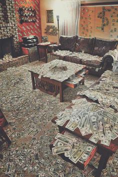 a living room filled with lots of money on the floor