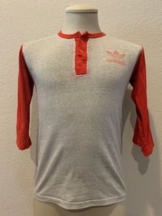 "Good Shape. Some minor discoloring on front and minor wear on lower back seam as shown Pit to pit is 18\" Top to bottom is 24\" Tag size: S Zacarrie21 1985 Room D" Retro Long Sleeve Sports T-shirt, 90s Style Red T-shirt For Sports, 90s Red Crew Neck Top, Red Crew Neck Top 90s Style, Retro Red Crew Neck Top, Retro Red College Tops, Retro Red Tops For College, Red Retro Tops For College, Throwback Long Sleeve Top With Screen Print