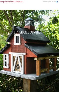 a bird house with the words cupola above it and an image of a dog