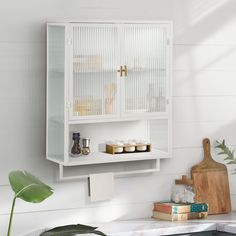 a white shelf with some items on it