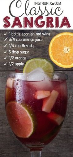 an image of sangria with oranges and lime