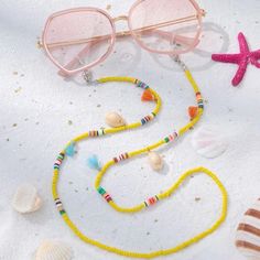 This Unique Glasses Chain Cowrie Puka Seashell Piece Is A Wonderful Addition To Your Wardrobe And Your Style; Sure To Get Lots Of Compliments! Y2k Vsco 90s Coastal Cottagecore Gshmhy00y0006fs Yellow Round Bead Necklaces For Summer, Yellow Round Beads Necklace For Summer, Yellow Necklaces With Colorful Beads For Summer, Yellow Necklace For Spring Beach Occasion, Multicolor Glasses Chains For Summer Beach, Multicolor Bohemian Glasses Chains For Summer, Bohemian Multicolor Glasses Chains For Summer, Multicolor Glasses Chains For Summer Parties, Yellow Round Bead Jewelry For Summer