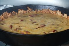 a casserole dish is cooking in an oven