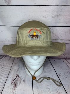 This listing is for 1 Boonie hat with Embroidered Happy Camper design on Front as seen in pictures. Boonie Hat is Khaki OR Navy. With option to purchase Back Embroidery text to personalize this hat Up to 9 letters for back embroidery with Your choice of font and thread color. Details: L/XL sizing per manufacturer one size fits most Sun blocker Fabric Aussie Cotton Twill Bucket ConstructionAdjustable Chin Cord Expand-A-Band® SizingOne Size Fits Most screen vents on sides www.facebook.com/embroide Fun Hats With Curved Brim For Outdoor Activities, Fun Curved Brim Hats For Outdoor Activities, Fun Cotton Hats For Outdoor, Fun Brimmed Outdoor Hat, Adjustable Outdoor Hat With Embroidered Logo, Brown Hats With Embroidered Logo For Summer, Brown Hat With Embroidered Logo For Summer, Brown Summer Hats With Embroidered Logo, Wide Brim Hat With Embroidered Logo For Outdoor