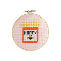 a cross stitch pattern with the words honey on it