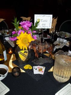 a table topped with lots of different types of food and drinks