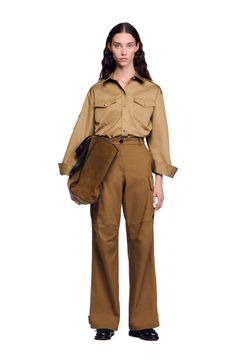 Straight-leg cargo trousers with side pockets and belt loops. Sandro Women's straight-leg trousers Cargo pockets with flaps on sides Side pockets Zip fastening with button The model is 5'8 tall and wears a size 36 Khaki Work Pants With Pockets, Khaki Work Pants With Pockets For Workwear, Khaki Straight-leg Parachute Pants For Work, Khaki Pants With Patch Pockets For Work, Workwear Parachute Pants With Flap Pockets, Khaki Cargo Pants With Patch Pockets For Work, Wide-leg Cargo Work Pants, Workwear Straight Parachute Pants With Flap Pockets, Straight Leg Cargo Parachute Pants For Workwear