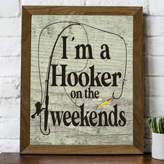 i'm a hooker on the tweekends sign in front of a brick wall