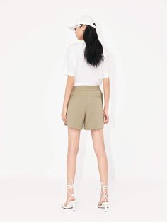 MO&Co. Women's Tailored Pleated Shorts with Belt Look your best in the tailored shorts! Featuring a high waist A-line silhouette and a detachable belt with a cargo pocket, these shorts flatter any figure. For added style, the shorts have hook and zipper closure and pleating details add a modern, timeless look that's perfect for any occasion. Features : - High waist A-line silhouette- Detachable belt with cargo pocket- Hook and zipper closure and pleating details Code: MBC2SOTT29The back length o Utility Style Knee-length Bermuda Shorts For Summer, Fitted Spring Cargo Shorts, Summer Utility Bermuda Knee-length Shorts, Utility Bermuda Knee-length Shorts For Summer, High Waist Utility Skort For Summer, Fitted Cargo Shorts For Summer, Fitted Cargo Shorts For Spring, Utility Knee-length Shorts For Summer, Utility Bermuda Shorts For Summer