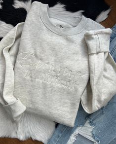 I can't be the only one who's Expensive and Difficult, right!? Embroidered on a soft, oatmeal heather sweatshirt S-4X Embroidered in cream thread for a monochromatic look Machine wash cold hang to dry ADULT AND CHILDDREN SHIRT COLORS MAY SLIGHTLY DIFFER DUE TO STOCK LEVELS COLORS MY SLIGHTLY DIFFER IN SIZES DUE TO STOCK LEVELS DUE TO ALL OF OUR ITEMS BEING HANDMADE PLEASE ALLOW UP TO 14 BUSSINESS DAYS FOR ORDERS TO BE PROSSESED. Expensive And Difficult, Boutique Tops, Country Western, Pet Clothes, Dress Accessories, Oatmeal, Colorful Shirts, Thread, Cream