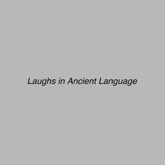 the words laughs in ancient language on a gray background