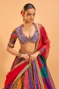 Multicolored attached cancan panelled lehenga with floral pattern and lace details. Paired with an embroidered blouse with tassel details and color blocked embroidered dupatta. - Aza Fashions Multicolor Organza Anarkali Set, Multicolor Fusion Traditional Wear For Wedding, Fitted Multicolor Organza Traditional Wear, Fusion Style Multicolor Lehenga With Cutdana, Multicolor Silk Lehenga For Reception, Fusion Style Multicolor Cutdana Lehenga, Multicolor Organza Set For Reception, Fusion Style Multicolor Cutdana Sets, Fusion Style Multicolor Sets With Cutdana