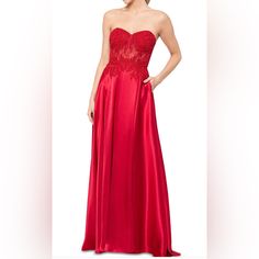 Please Note This Dress Is New But Missing The String To Tie The Dress. Currently, On Macy’s Website For $269.00. Imported Sweetheart Strapless Neckline; Gown Silhouette Floor-Length Formal Dress Lined Lace At Bodice Back Zipper Closure; Lace-Up Detail At Back Bodice Size & Fit Approx. 60-1/2" Long From Center Back Neck To Hem. Length Is Based On Size 5 And Varies 1/2" Between Sizes Charmeuse Gown, Strappy Gown, Black Formal Gown, Emerald Green Prom Dress, Gown Silhouette, Red Halter Dress, Short Formal Dress, Winter Formal Dresses, Junior Prom Dresses