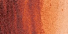 an orange and red background with some rust on the bottom part of it's surface